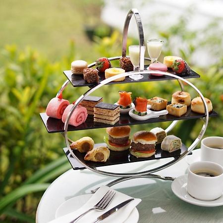 Grand Coloane Resort Macau Exteriör bild Afternoon tea at the InterContinental Sanctuary Cove Resort, Queensland, Australia